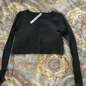 lululemon ebb to street long sleeve in rain forest green, NWOT, never used